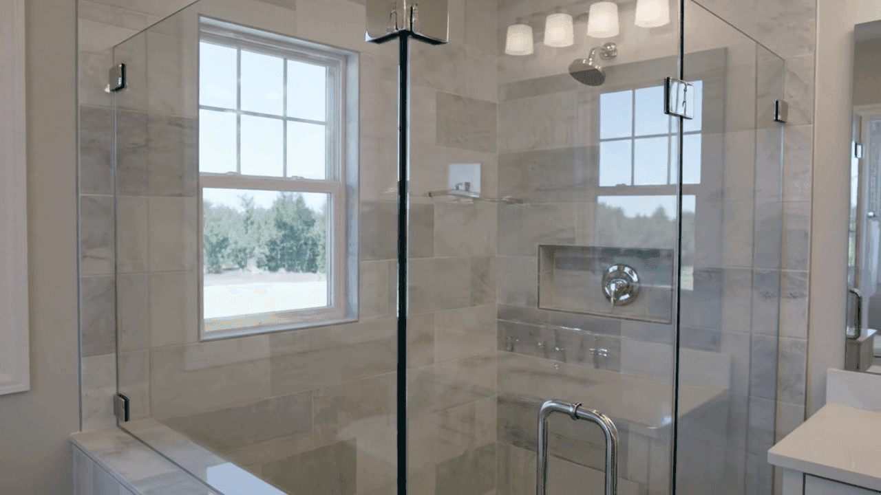 Frameless corner glass enclosure